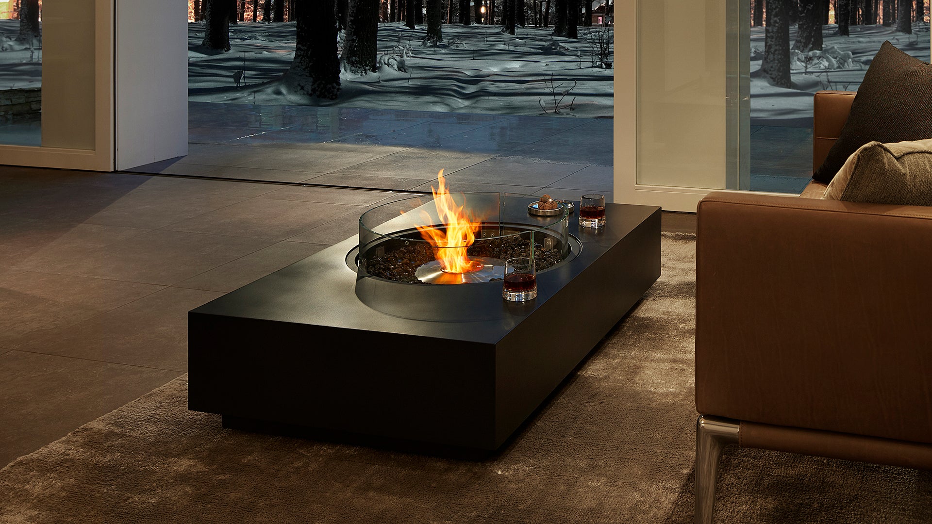 Modern fire pit table with flames in a living room setting