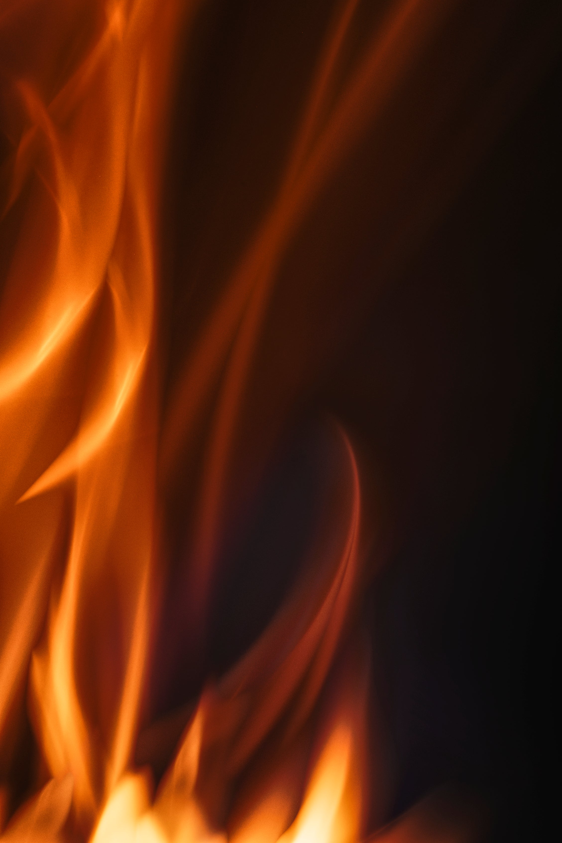 Close-up of flames against a dark background