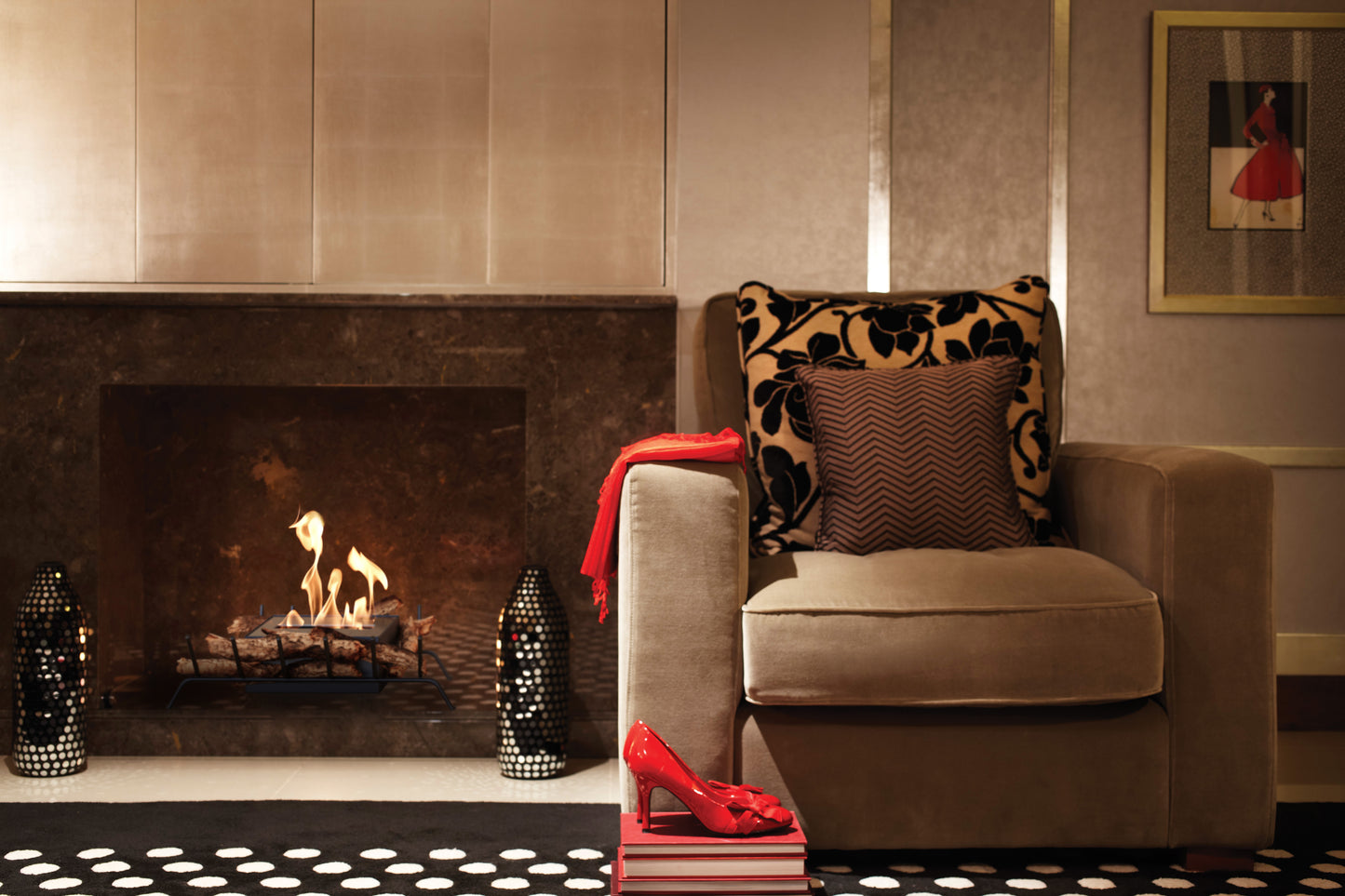 Cozy living room with a fireplace, armchair, and decorative elements.