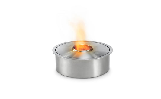 Stainless steel fire burner insert with flame on a white background