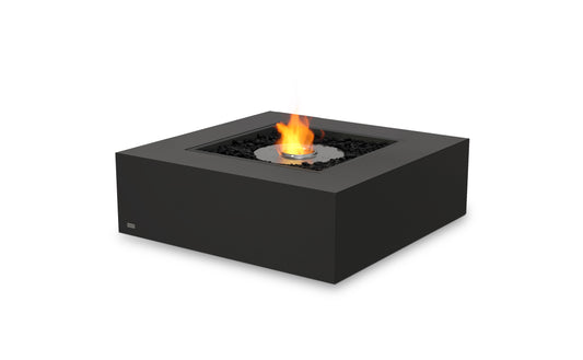Black square fire pit table with flames on a white background