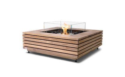 Wooden fire pit table with glass cover on a white background