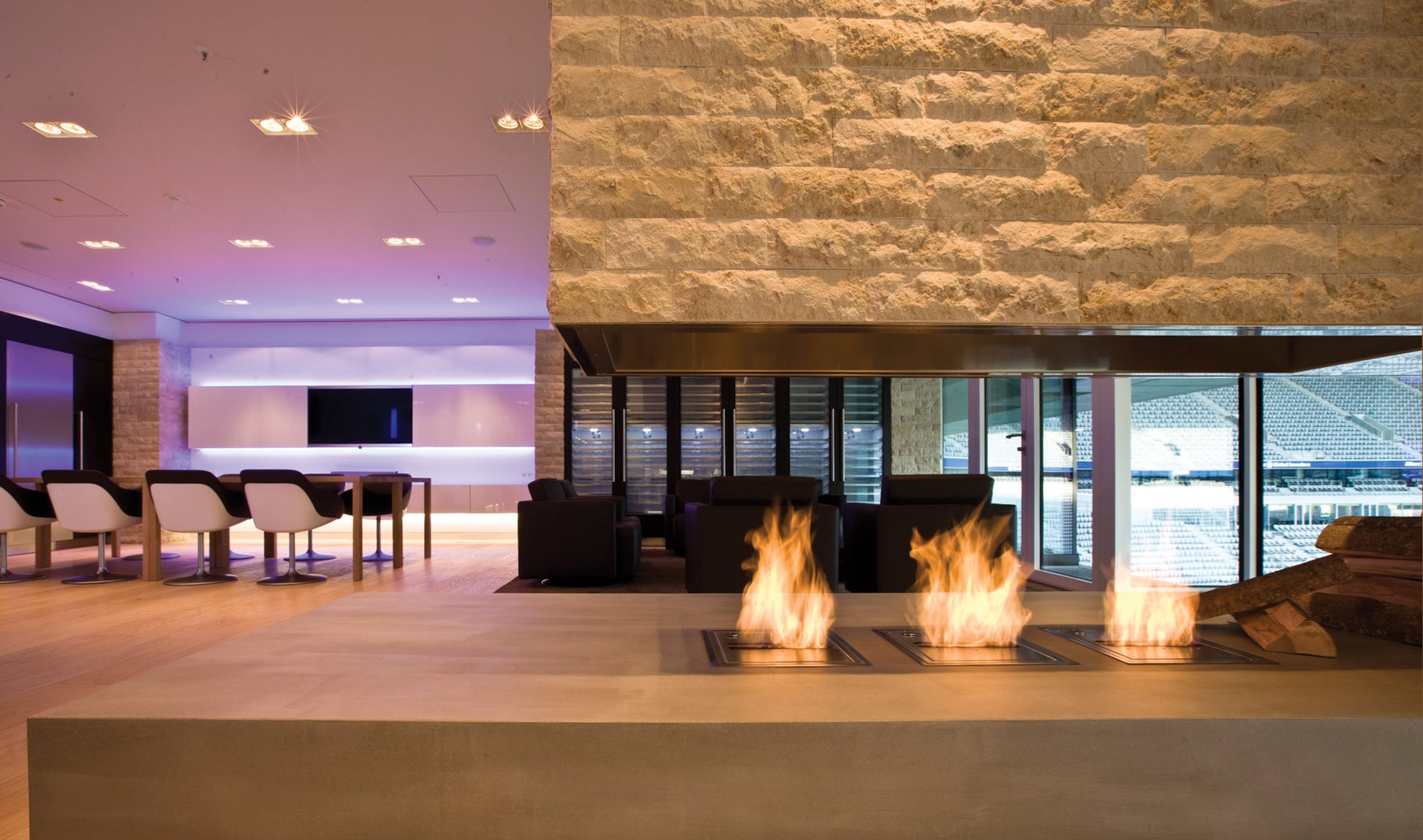 Modern interior with stone fireplace and seating area