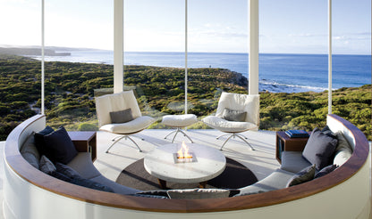 Modern outdoor seating area with ocean view