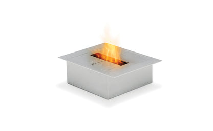 Modern square fire pit with flames on a white background