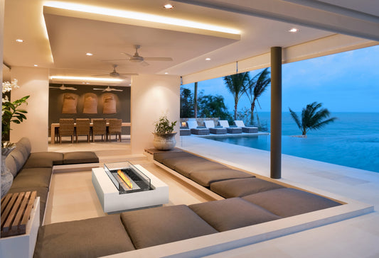 Modern living room with ocean view and fire pit