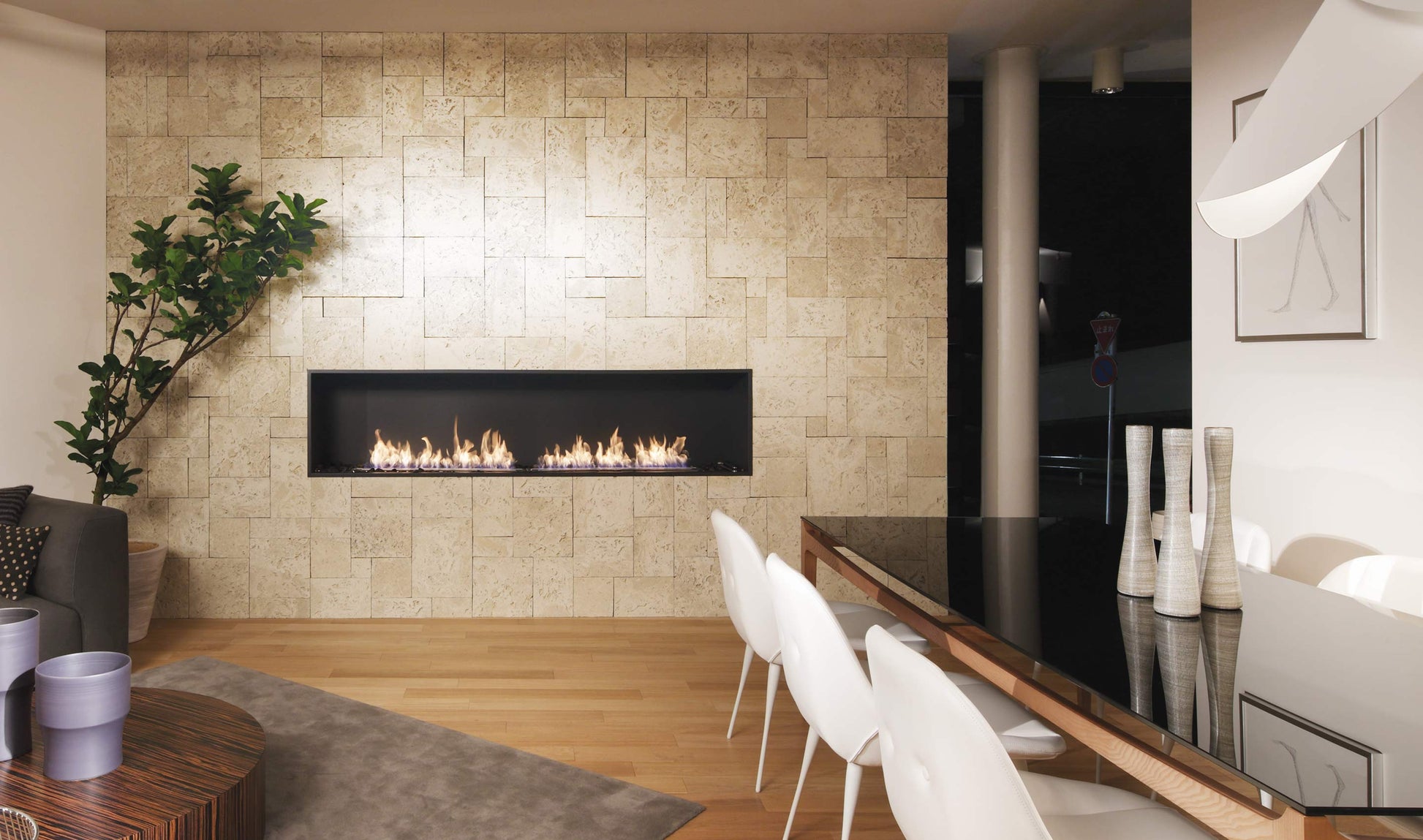 Modern living room with a fireplace, white chairs, and a dining table.