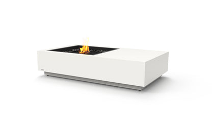 Modern white fire pit table with flames on a white background