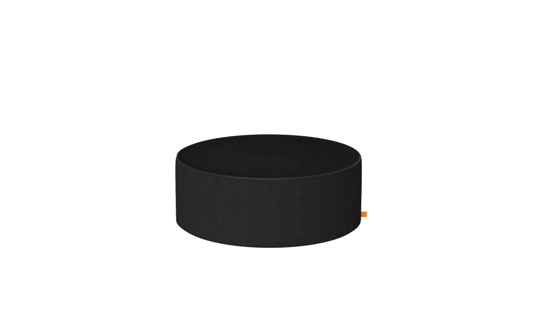 Black circular object on a white background