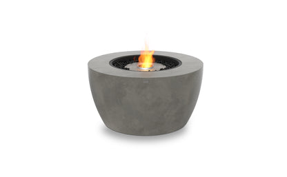 Concrete fire pit with flames on a white background