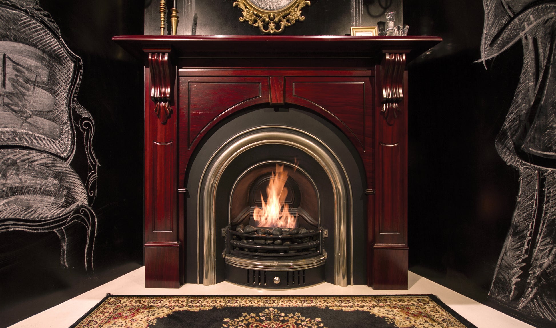 Decorative fireplace with a lit fire, surrounded by ornate furniture.