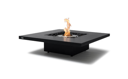 Modern black fire pit table with flames on a white background