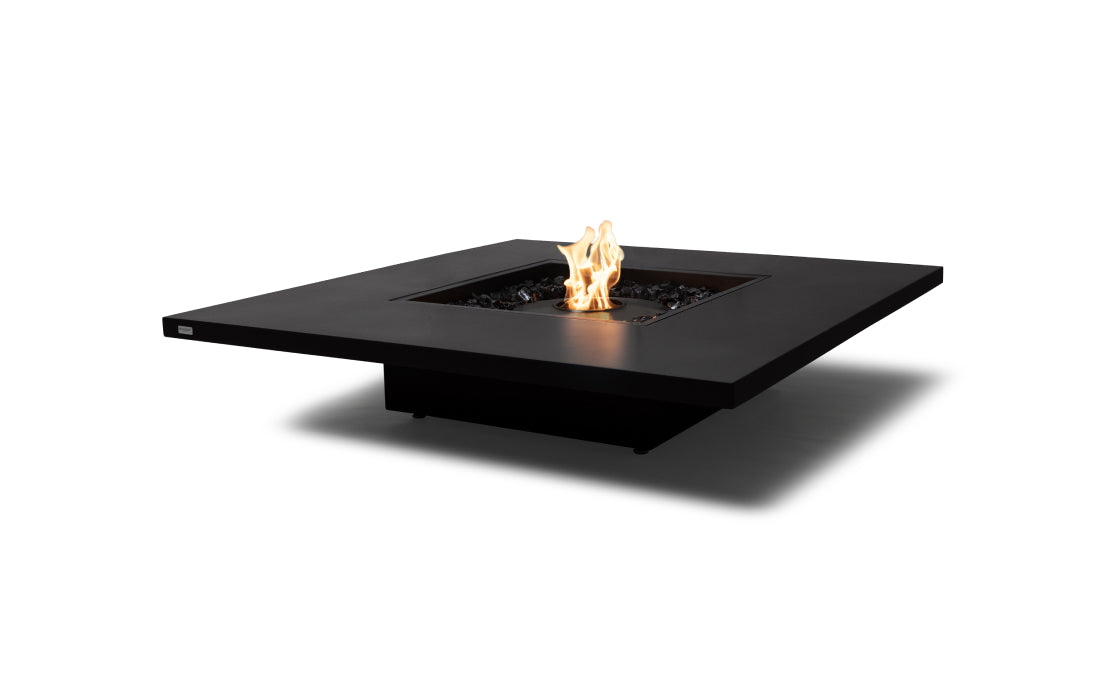 Black fire pit table with flames on a white background