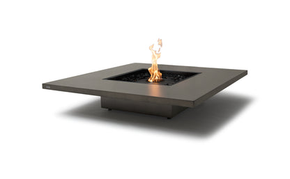 Modern fire pit table with flames on a white background