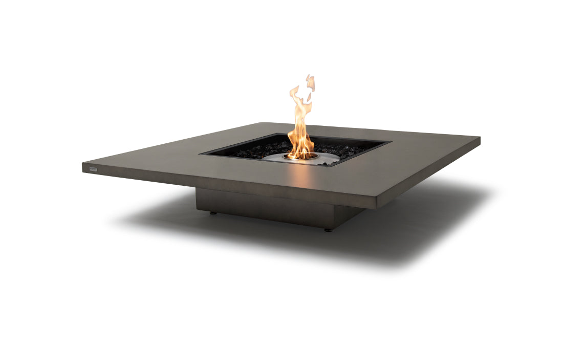 Modern fire pit table with flames on a white background