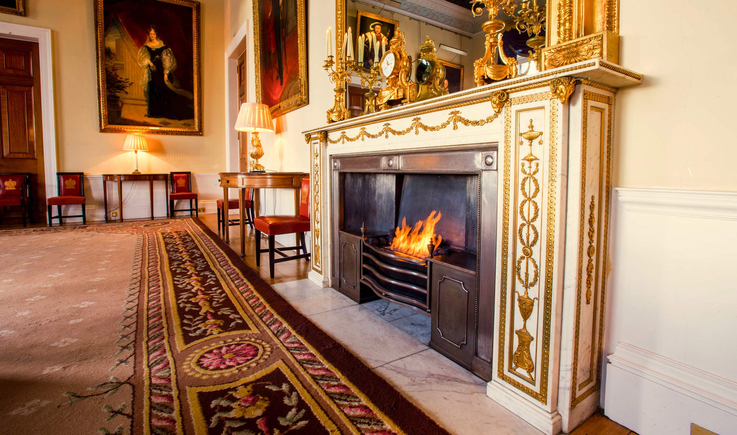 Grand room with ornate fireplace and decorative elements