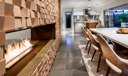 Modern living room with a fireplace and dining area