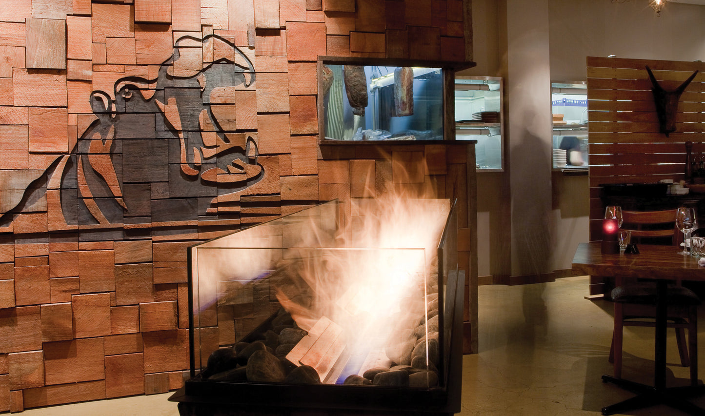 Wooden wall with decorative cutout and fireplace in a restaurant setting