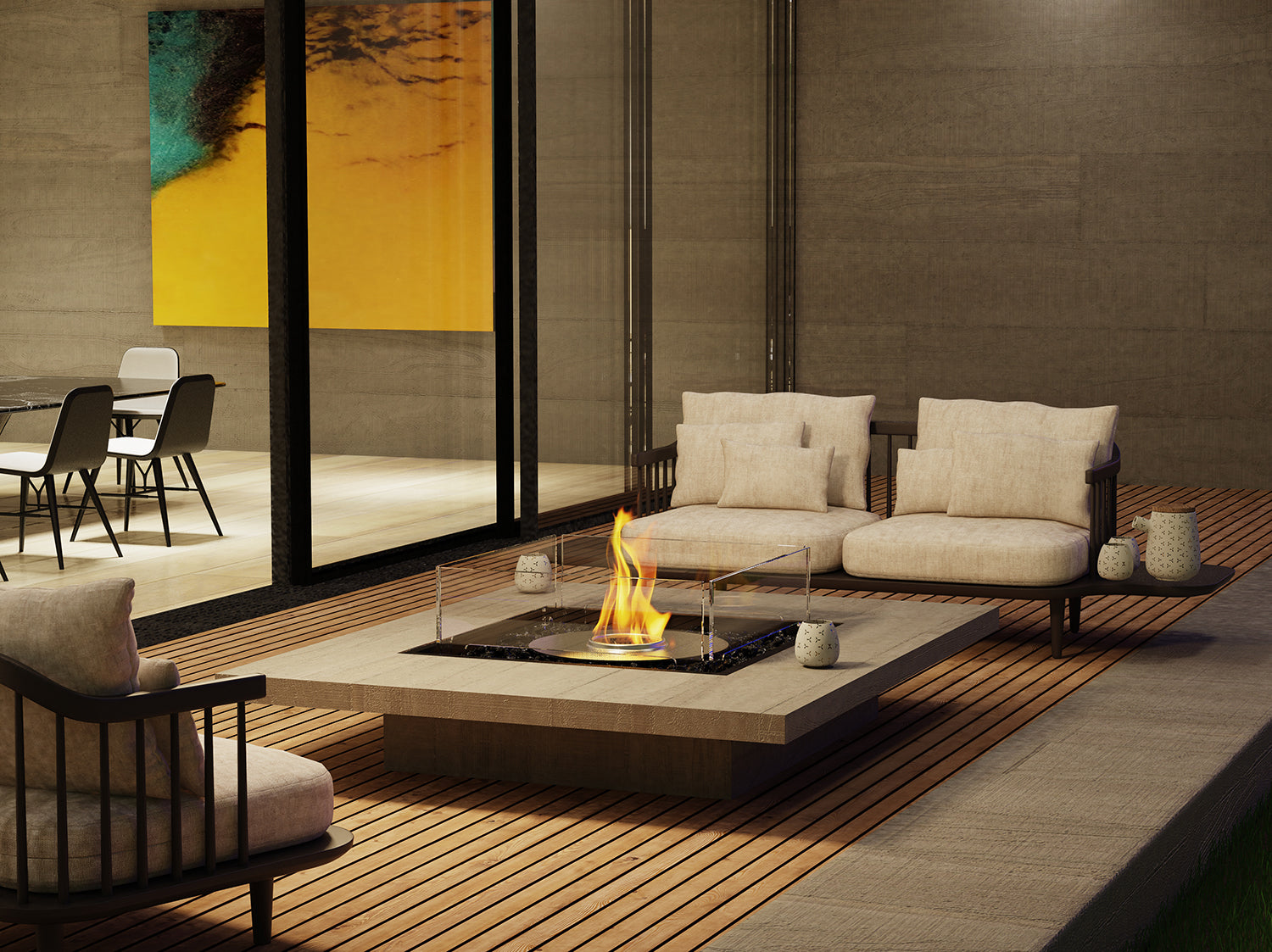 Modern outdoor living space with a fire pit, seating area, and abstract art on the wall.